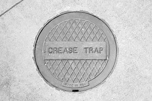 neglecting grease trap pumping can lead to costly plumbing issues, foul odors, and potential fines for environmental violations